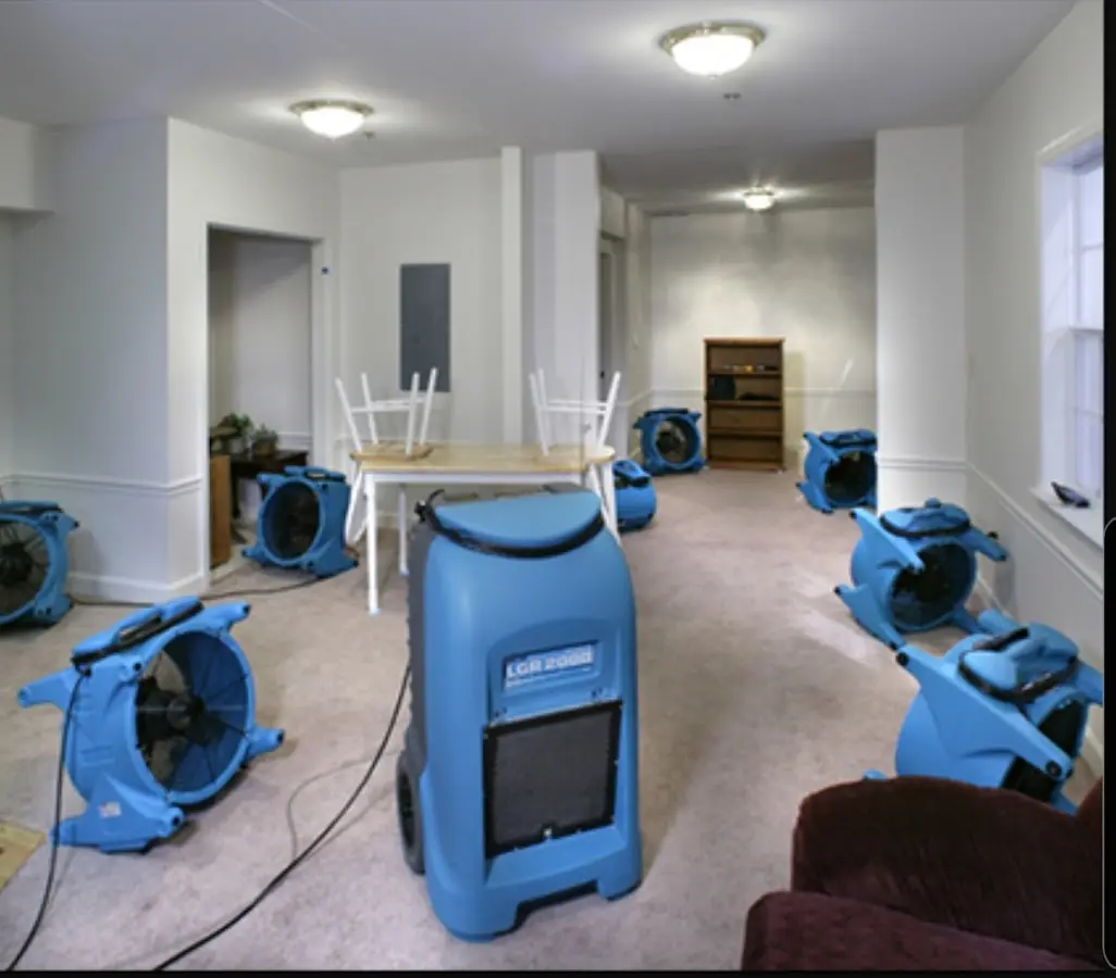 Air movers and dehumidifier setup for Water Damage Restoration in Apopka